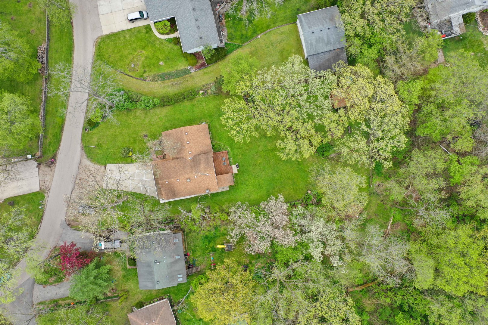 7712 Ravina Drive Spring Grove, IL 60081 - Photo 26 of 30 an aerial view of a house with a yard