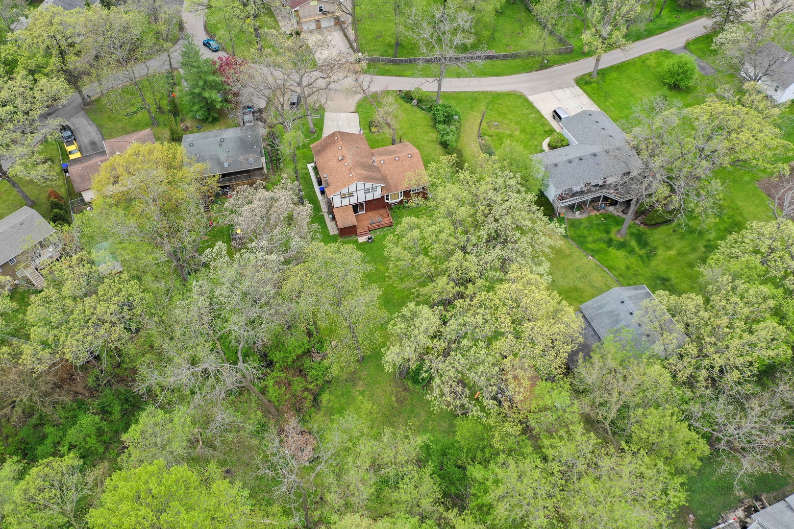 7712 Ravina Drive Spring Grove, IL 60081 - Photo 27 of 30 an aerial view of a house with a yard