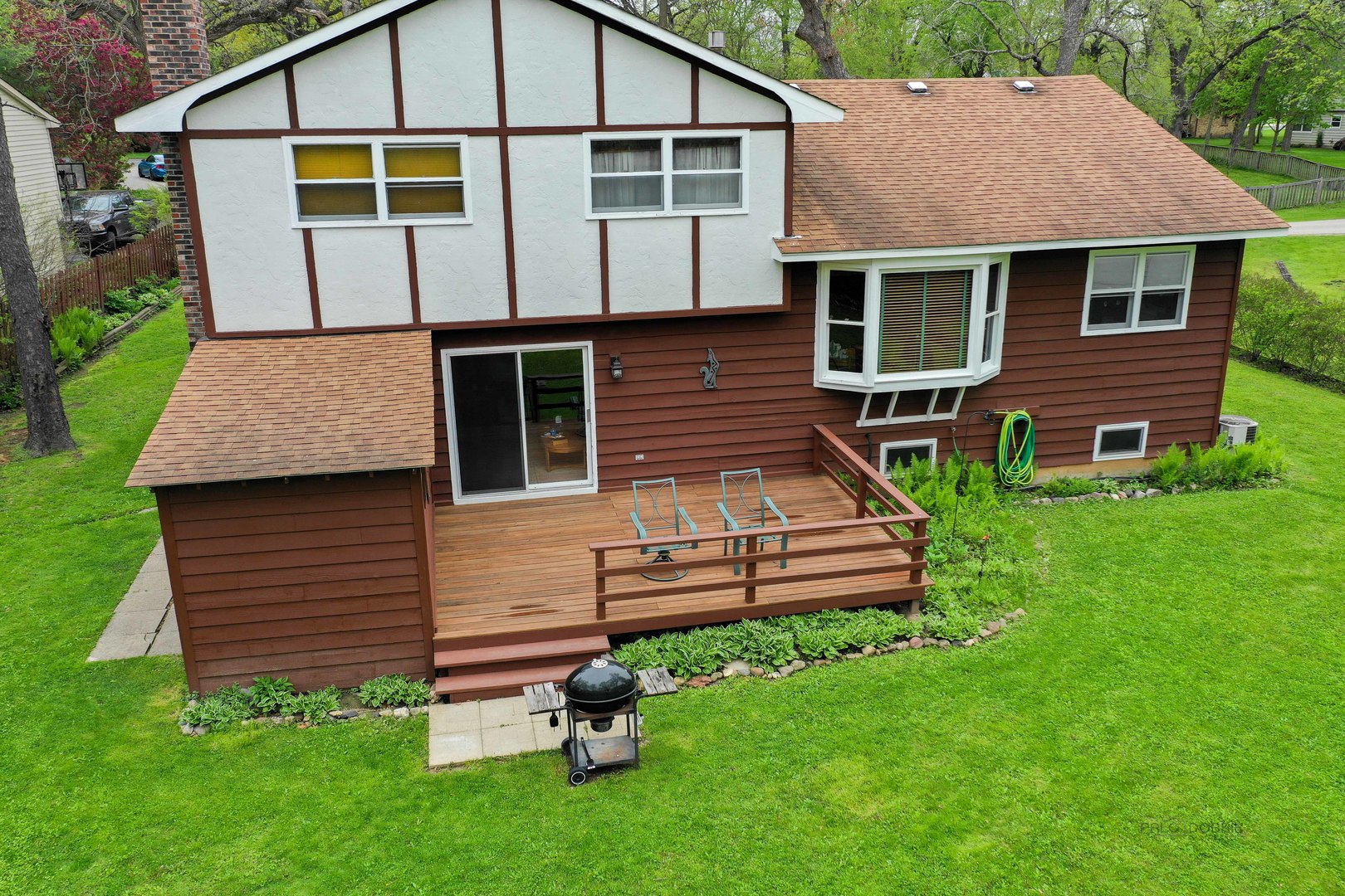 7712 Ravina Drive Spring Grove, IL 60081 - Photo 29 of 30 a front view of a house with a yard