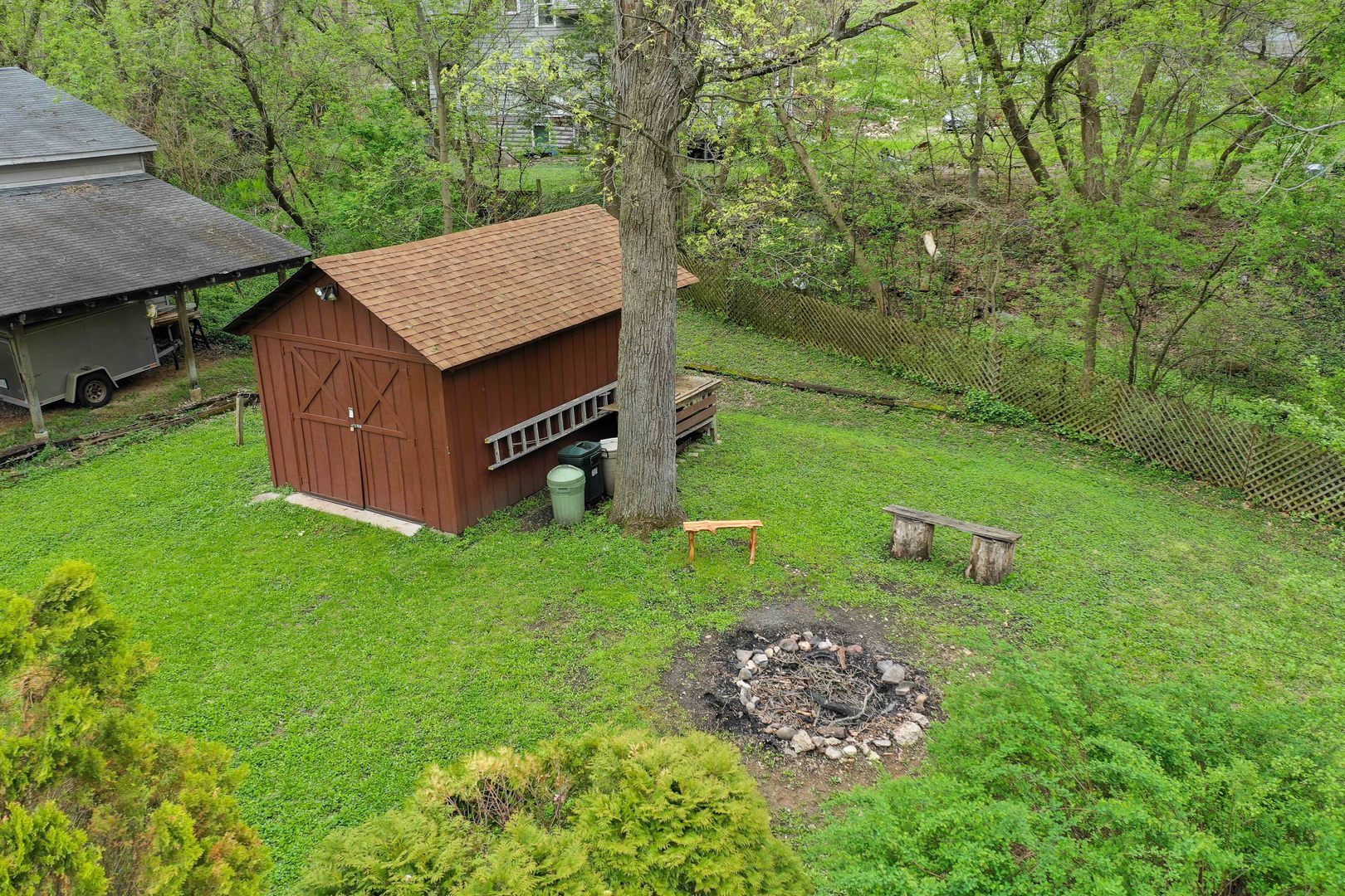 7712 Ravina Drive Spring Grove, IL 60081 - Photo 30 of 30 a backyard of a house with lots of green space