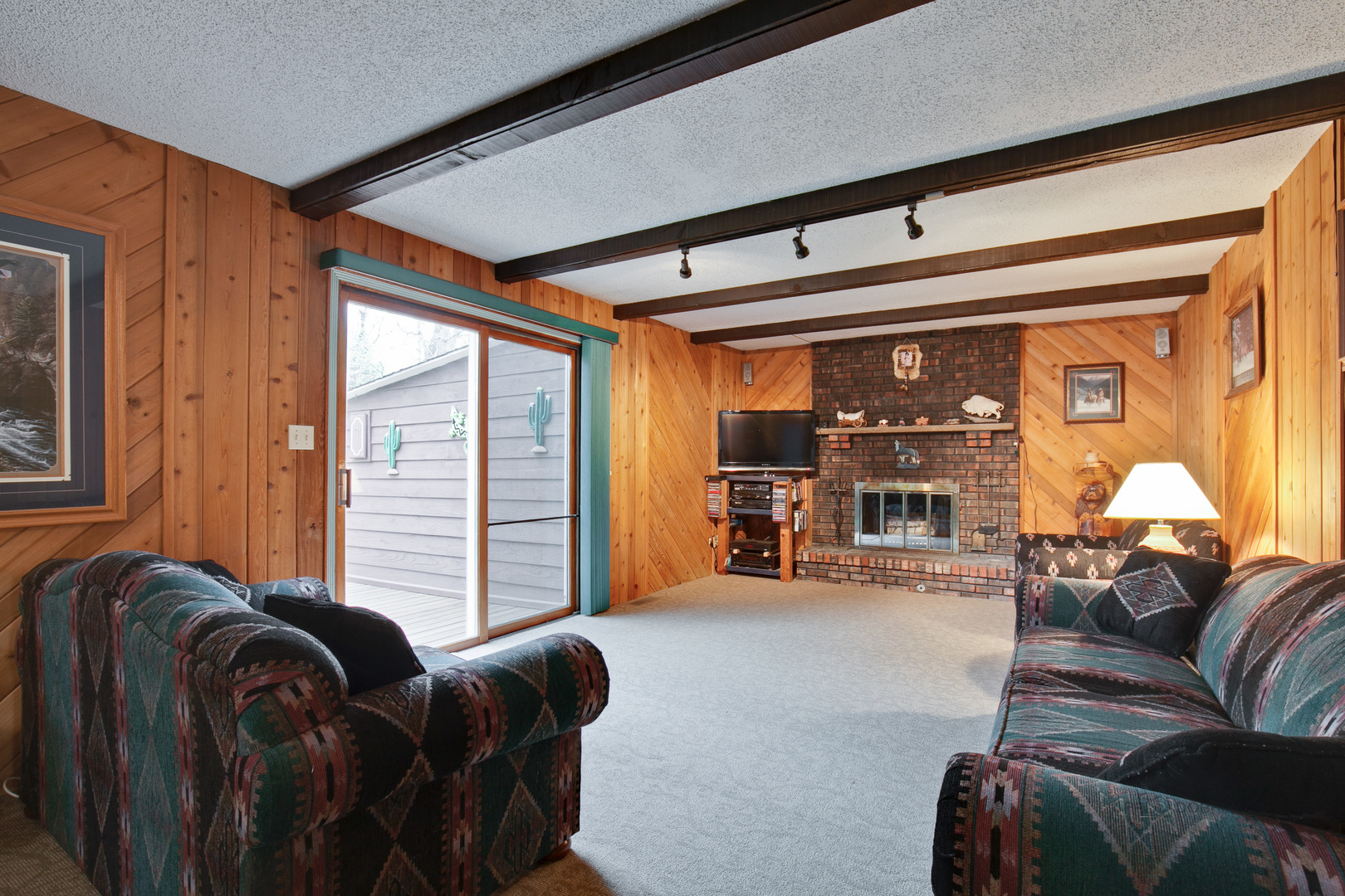7712 Ravina Drive Spring Grove, IL 60081 - Photo 5 of 30 a livingroom with furniture and a large window