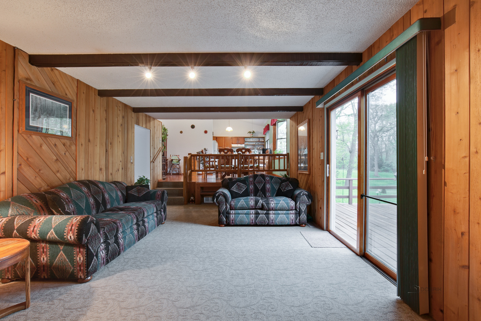 7712 Ravina Drive Spring Grove, IL 60081 - Photo 6 of 30 a living room with furniture and a large window