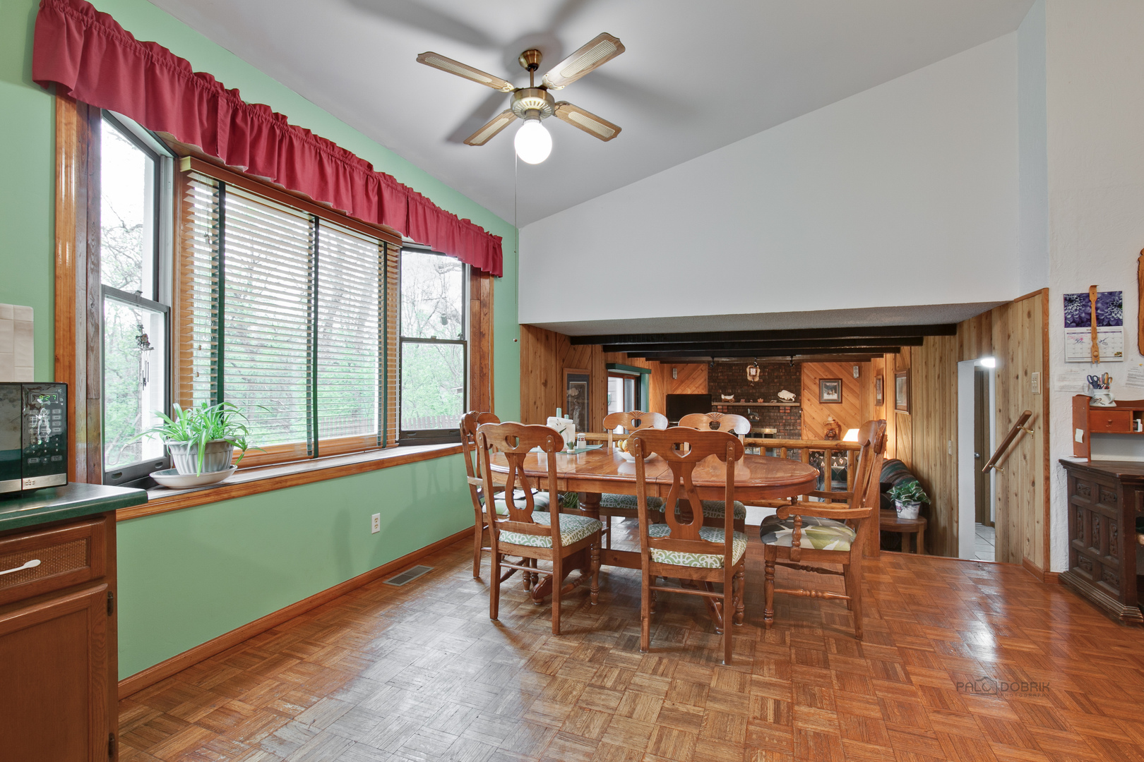 7712 Ravina Drive Spring Grove, IL 60081 - Photo 10 of 30 a view of a dining room with furniture window and outside view
