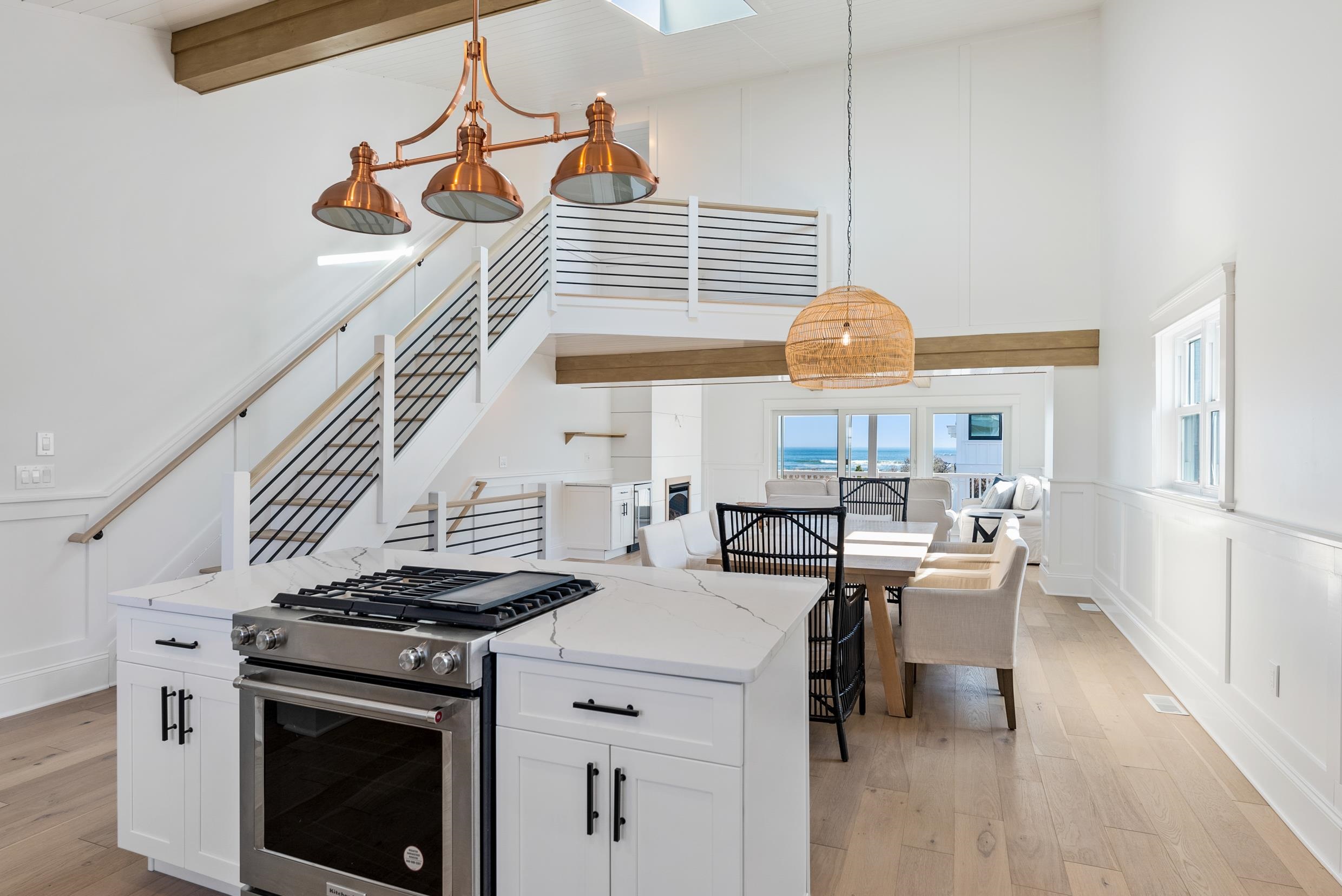 2701 Landis Avenue, Unit B SOUTH Sea Isle City, NJ 08243 - Photo 13 of 34 a kitchen with stainless steel appliances a stove a chimney a sink and cabinets