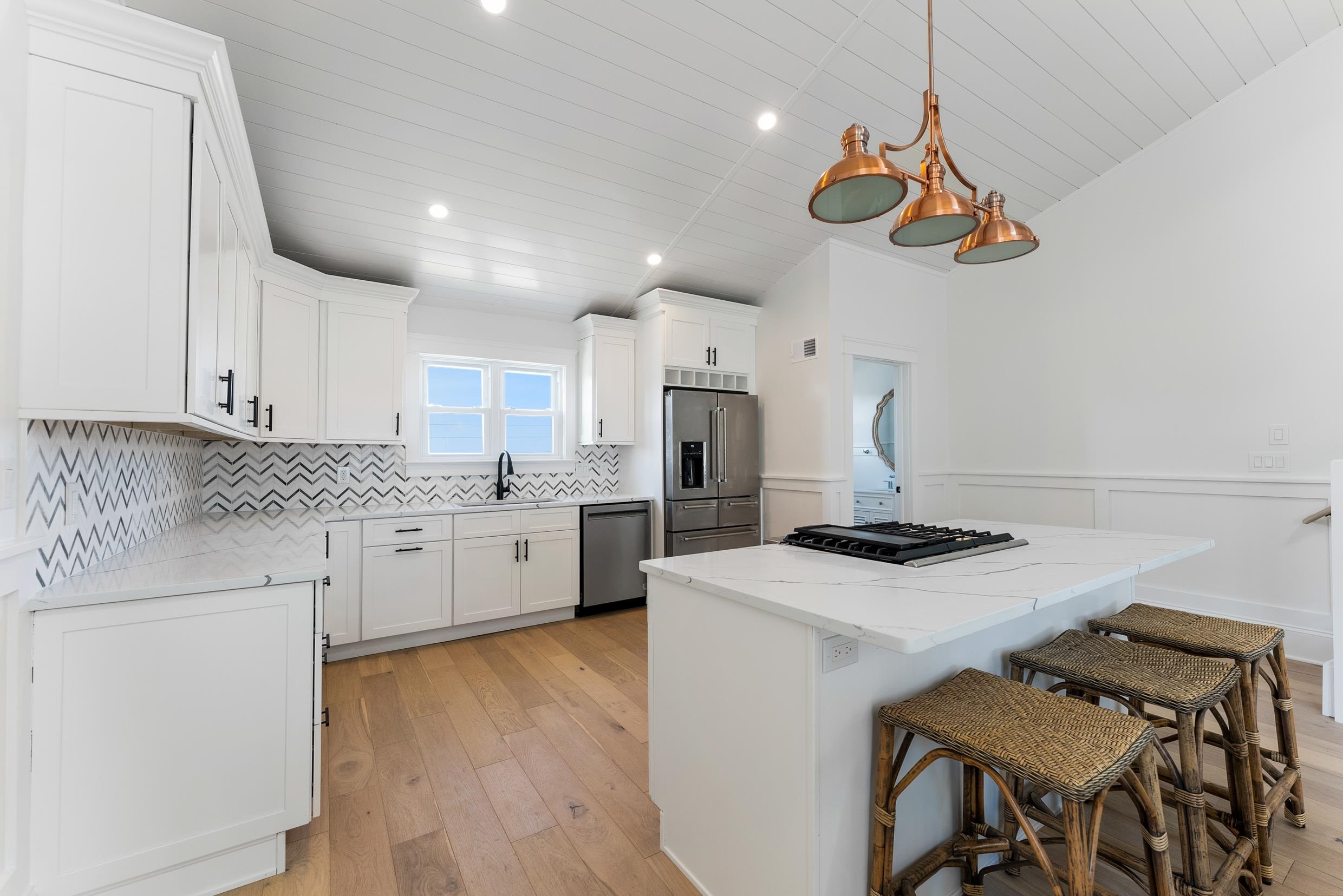 2701 Landis Avenue, Unit B SOUTH Sea Isle City, NJ 08243 - Photo 15 of 34 a kitchen with a stove cabinets and wooden floor