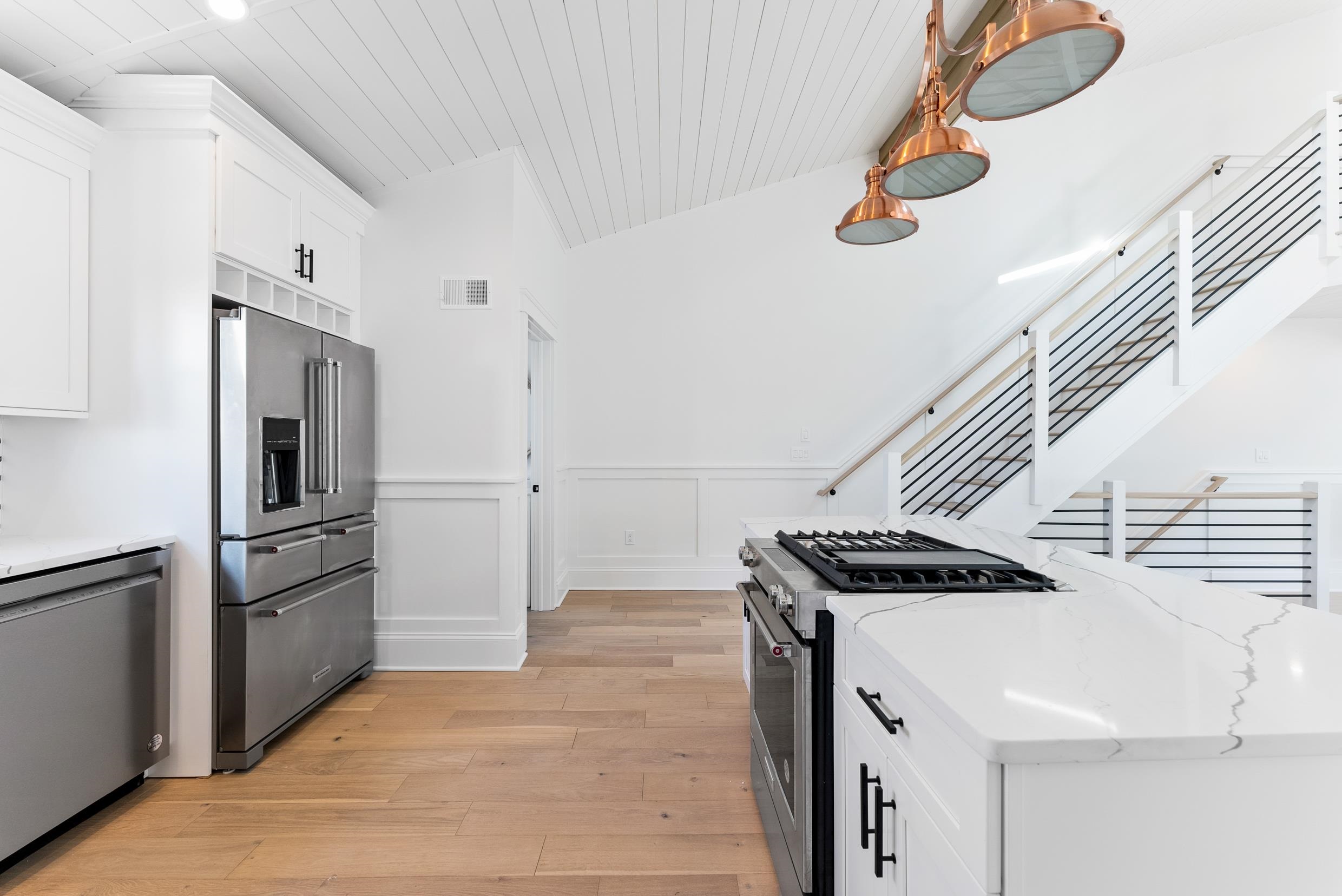 2701 Landis Avenue, Unit B SOUTH Sea Isle City, NJ 08243 - Photo 17 of 34 a kitchen with stainless steel appliances kitchen island a refrigerator and a stove top oven