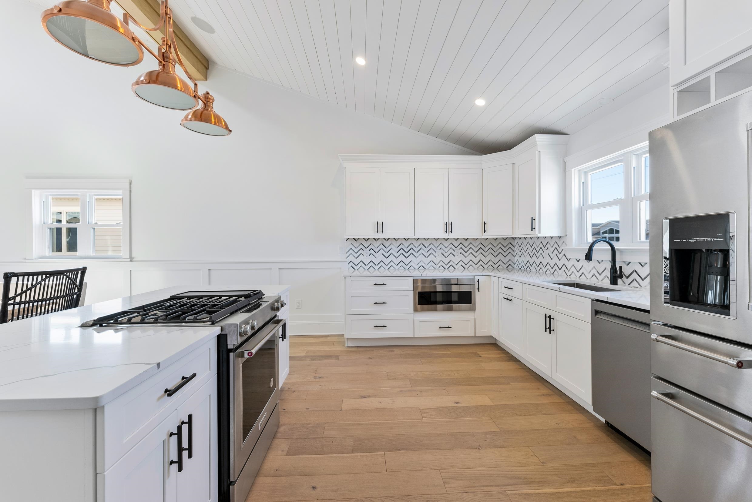 2701 Landis Avenue, Unit B SOUTH Sea Isle City, NJ 08243 - Photo 18 of 34 a kitchen with stainless steel appliances granite countertop a stove and a sink
