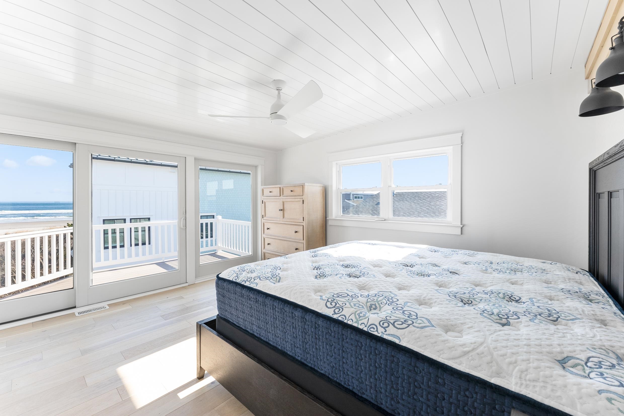 2701 Landis Avenue, Unit B SOUTH Sea Isle City, NJ 08243 - Photo 19 of 34 a bedroom with a bed and a window