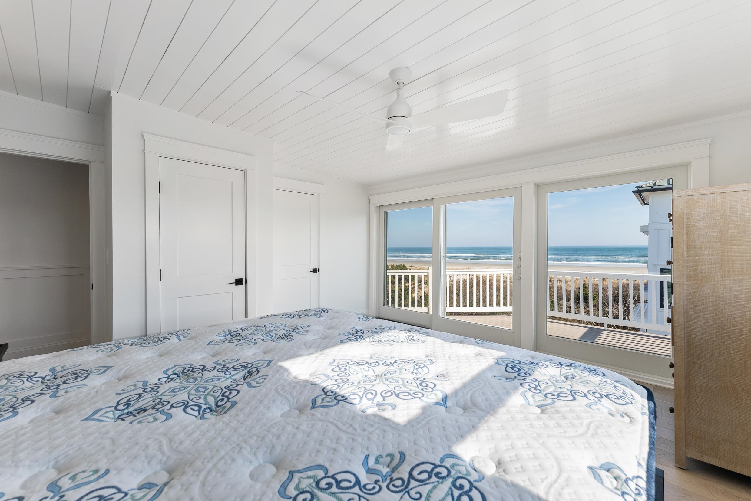 2701 Landis Avenue, Unit B SOUTH Sea Isle City, NJ 08243 - Photo 20 of 34 a bedroom with a large bed and a window