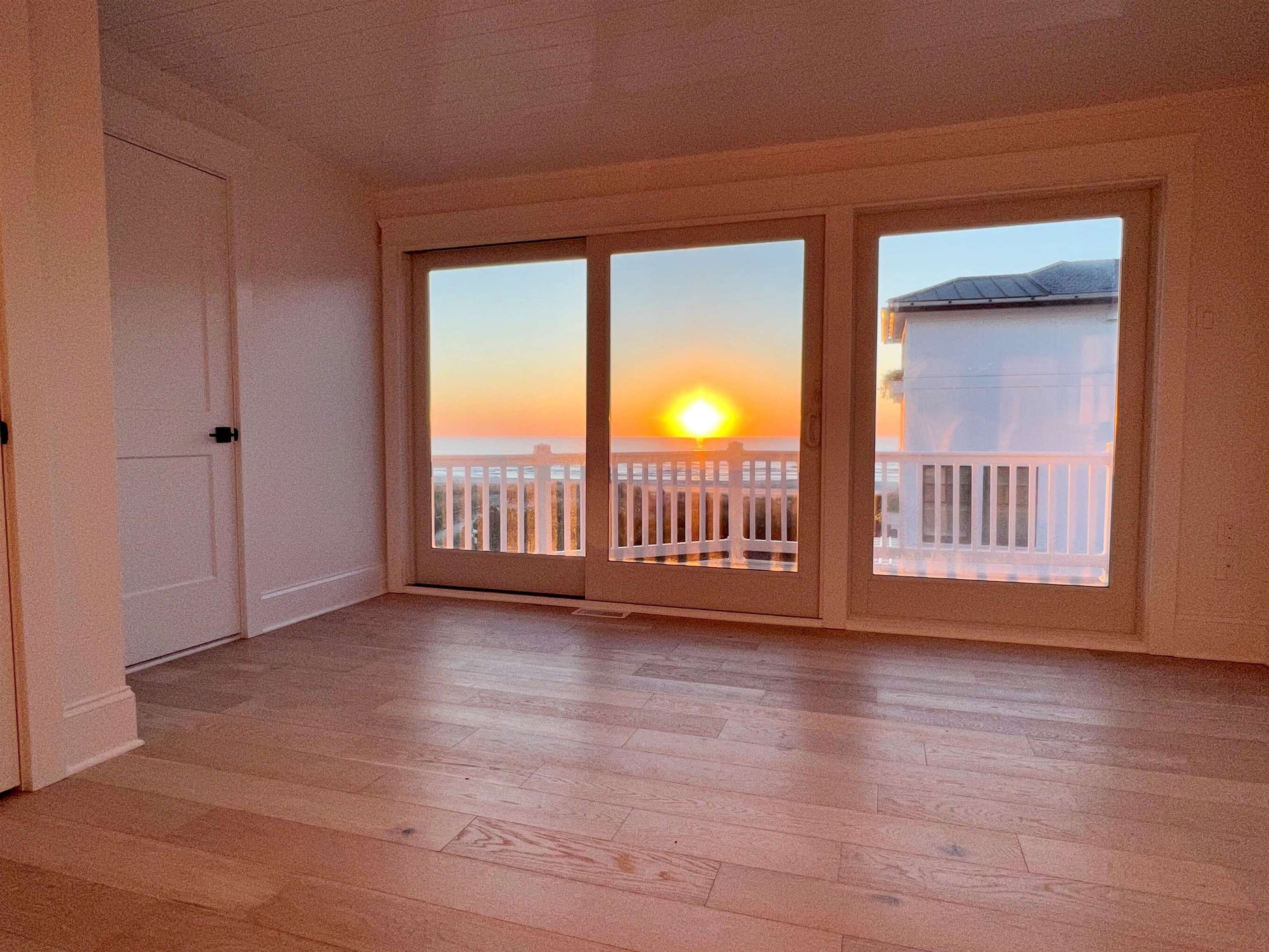 2701 Landis Avenue, Unit B SOUTH Sea Isle City, NJ 08243 - Photo 21 of 34 a view of an empty room with wooden floor and a window