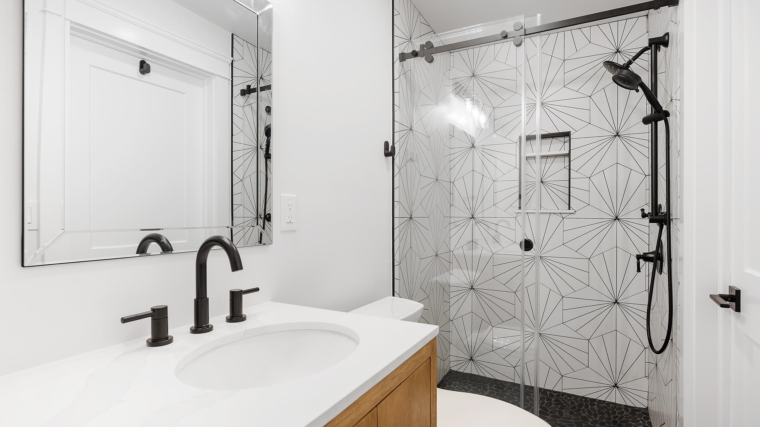 2701 Landis Avenue, Unit B SOUTH Sea Isle City, NJ 08243 - Photo 24 of 34 a bathroom with a sink vanity granite shower and a mirror