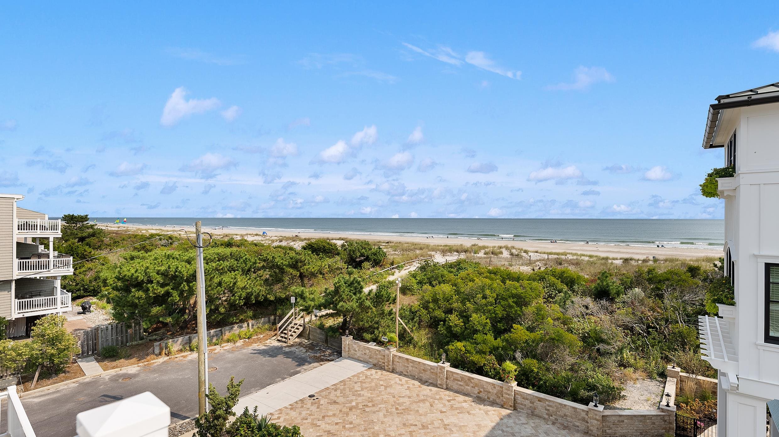 2701 Landis Avenue, Unit B SOUTH Sea Isle City, NJ 08243 - Photo 8 of 34 a view of an outdoor space and a yard