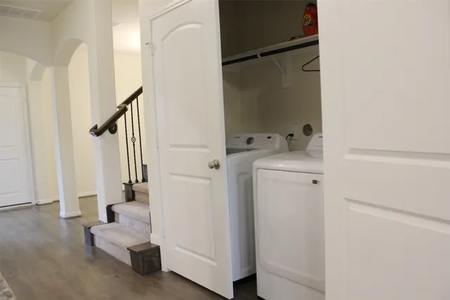 a utility room with dryer and washer