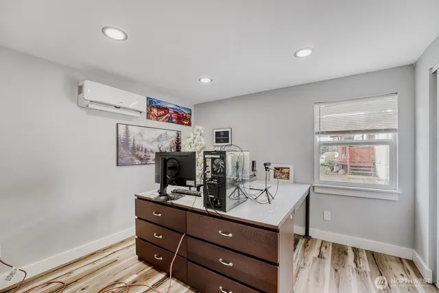 a room with a couch and a dresser