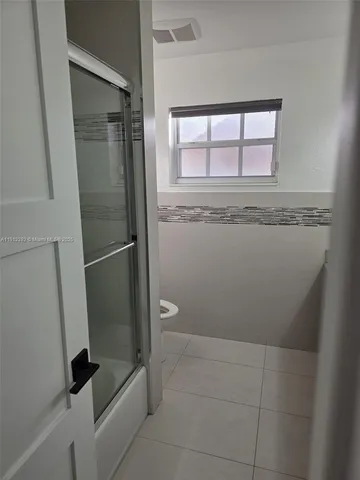 a view of a porch and livingroom