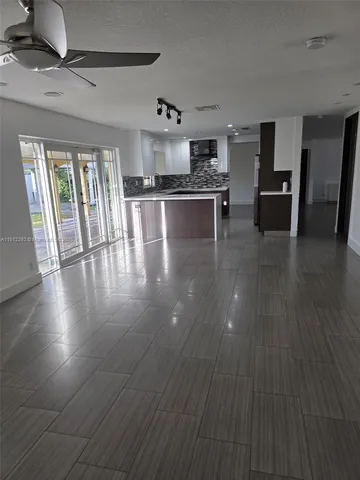 a view of a kitchen with a sink