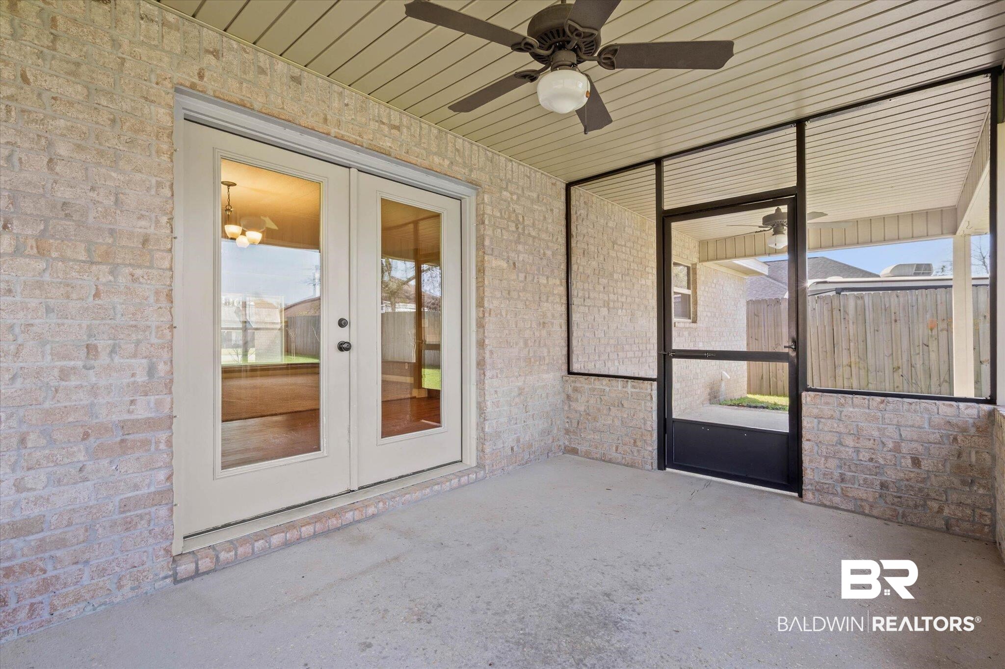 101 Washington Boulevard Foley, AL 36535 - Photo 23 of 32 Unfurnished sunroom with french doors and ceiling fan