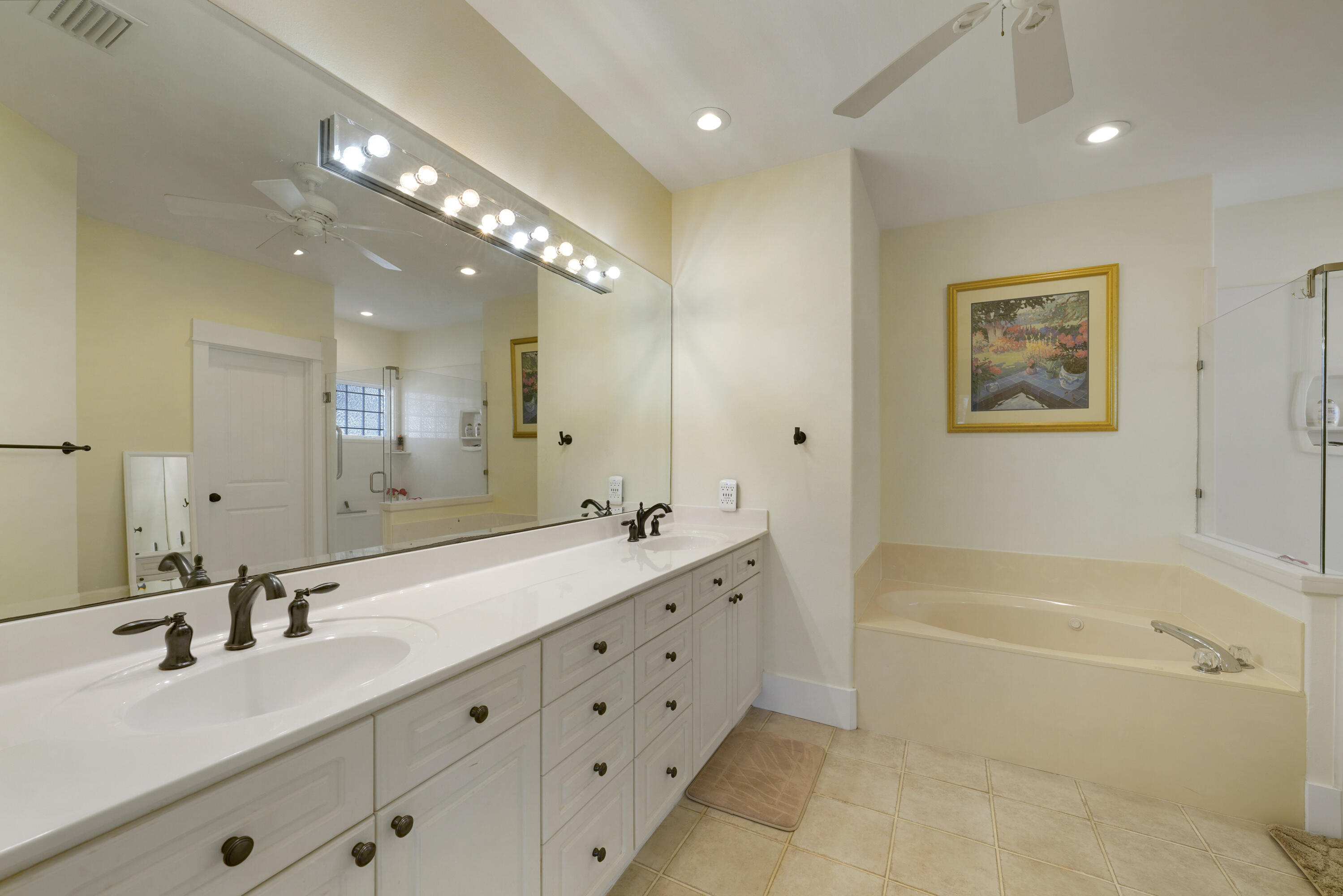 8026 Legend Creek Dr. Miramar Beach, FL 32550 - Photo 23 of 88 a bathroom with a tub a sink double vanity and a mirror