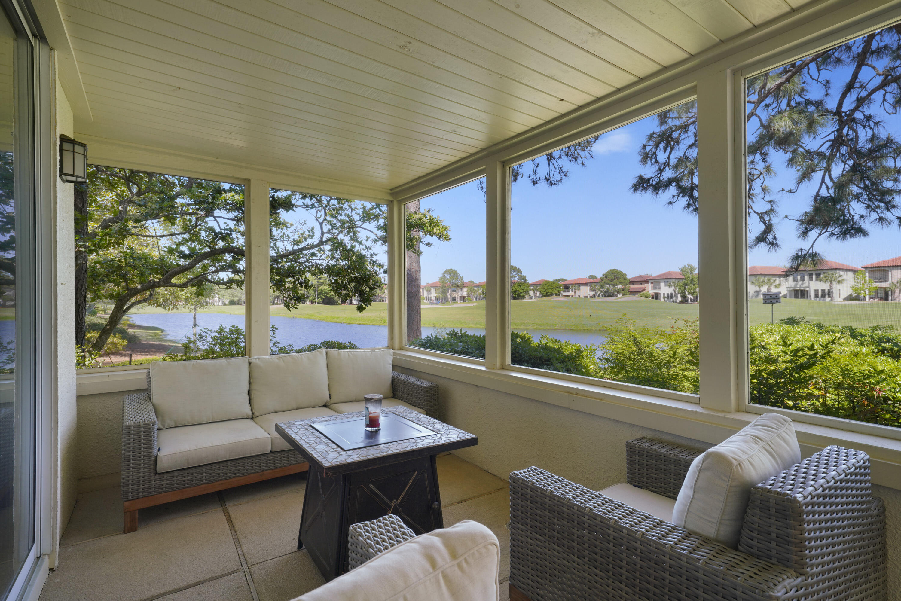 8026 Legend Creek Dr. Miramar Beach, FL 32550 - Photo 29 of 88 a living room with furniture and a large window