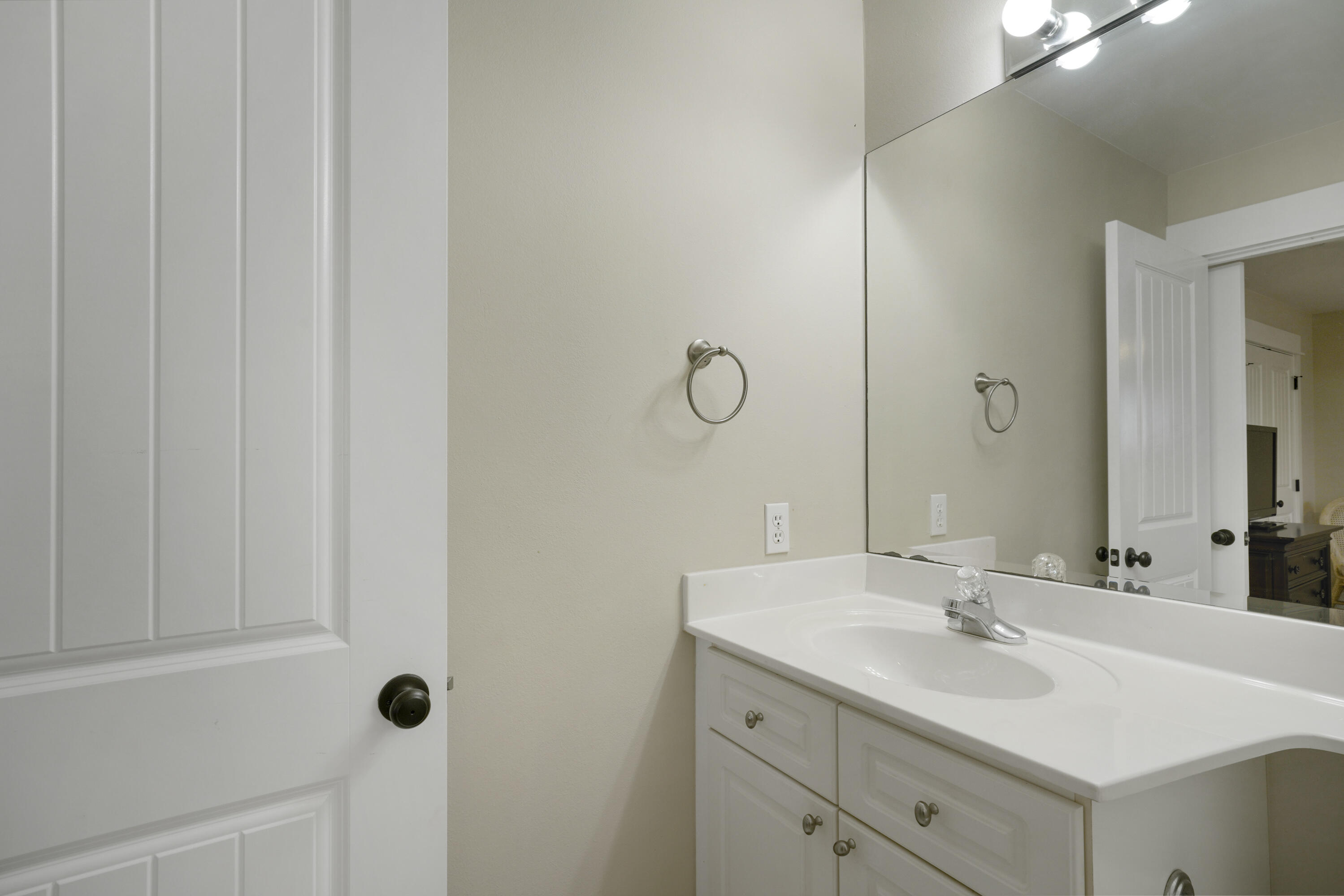 8026 Legend Creek Dr. Miramar Beach, FL 32550 - Photo 40 of 88 a bathroom with a sink and a mirror