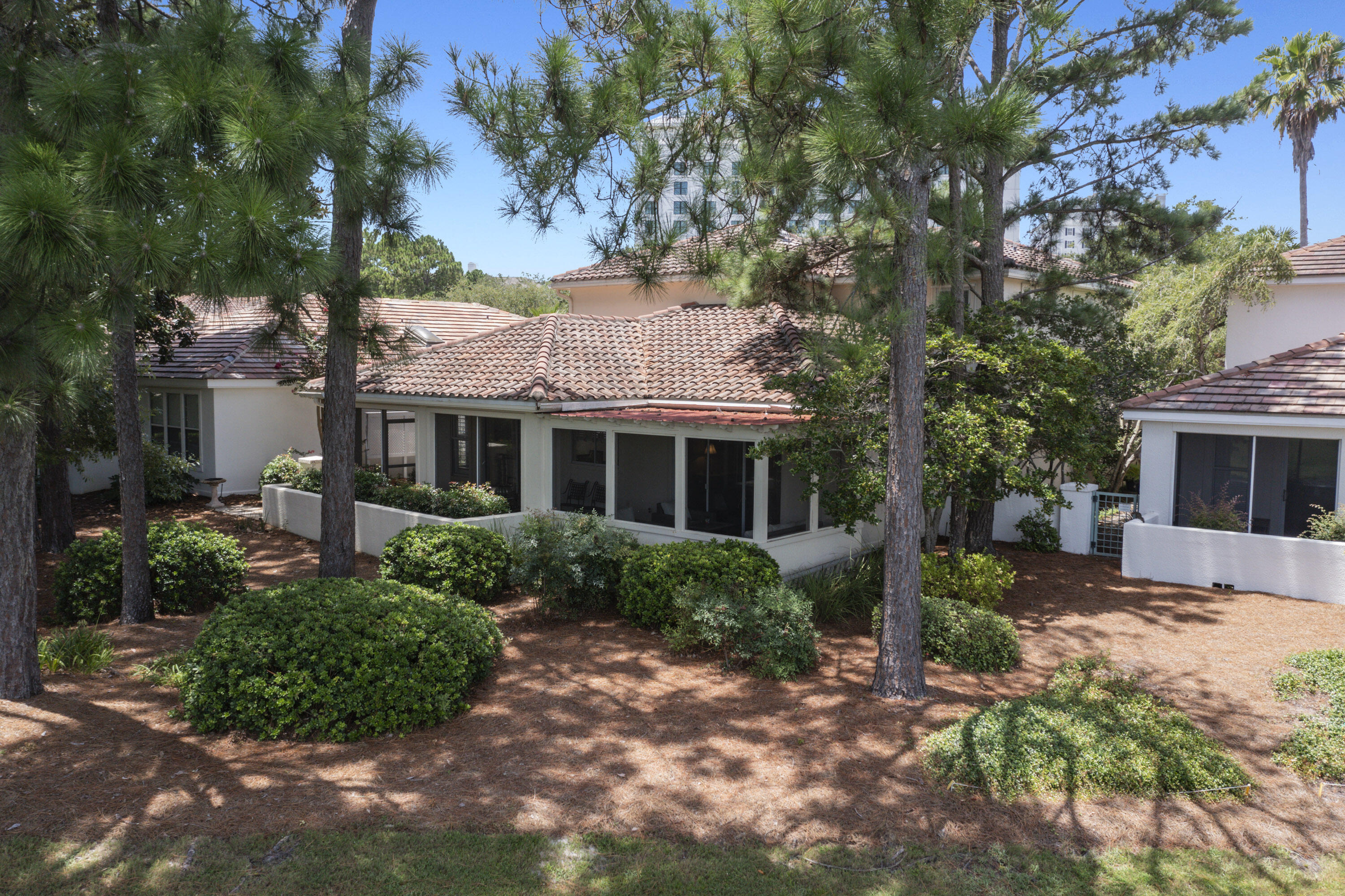 8026 Legend Creek Dr. Miramar Beach, FL 32550 - Photo 45 of 88 a view of house with outdoor seating and covered with trees