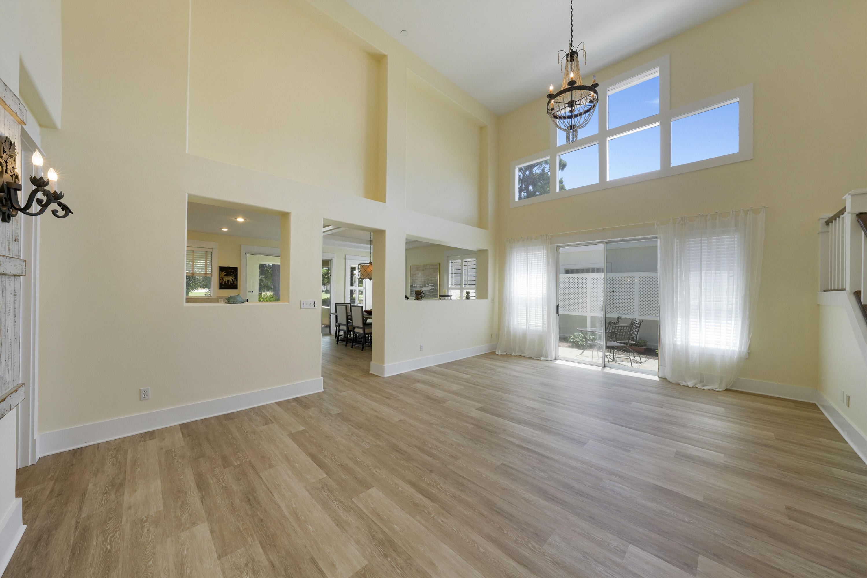 8026 Legend Creek Dr. Miramar Beach, FL 32550 - Photo 8 of 88 a view of a livingroom with wooden floor and windows