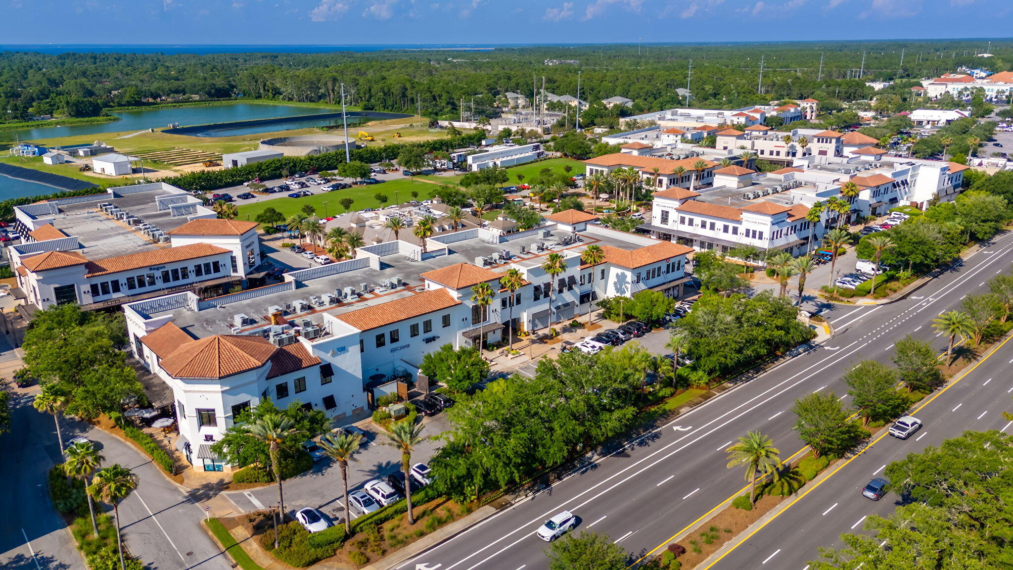 8026 Legend Creek Dr. Miramar Beach, FL 32550 - Photo 85 of 88 an aerial view of a city with lots of residential buildings ocean and mountain view in back