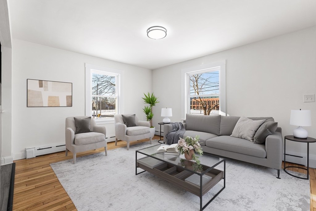 26 River Street Billerica, MA 01821 - Photo 5 of 10 a living room with furniture and a rug