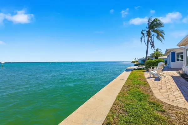 a view of swimming pool with a garden