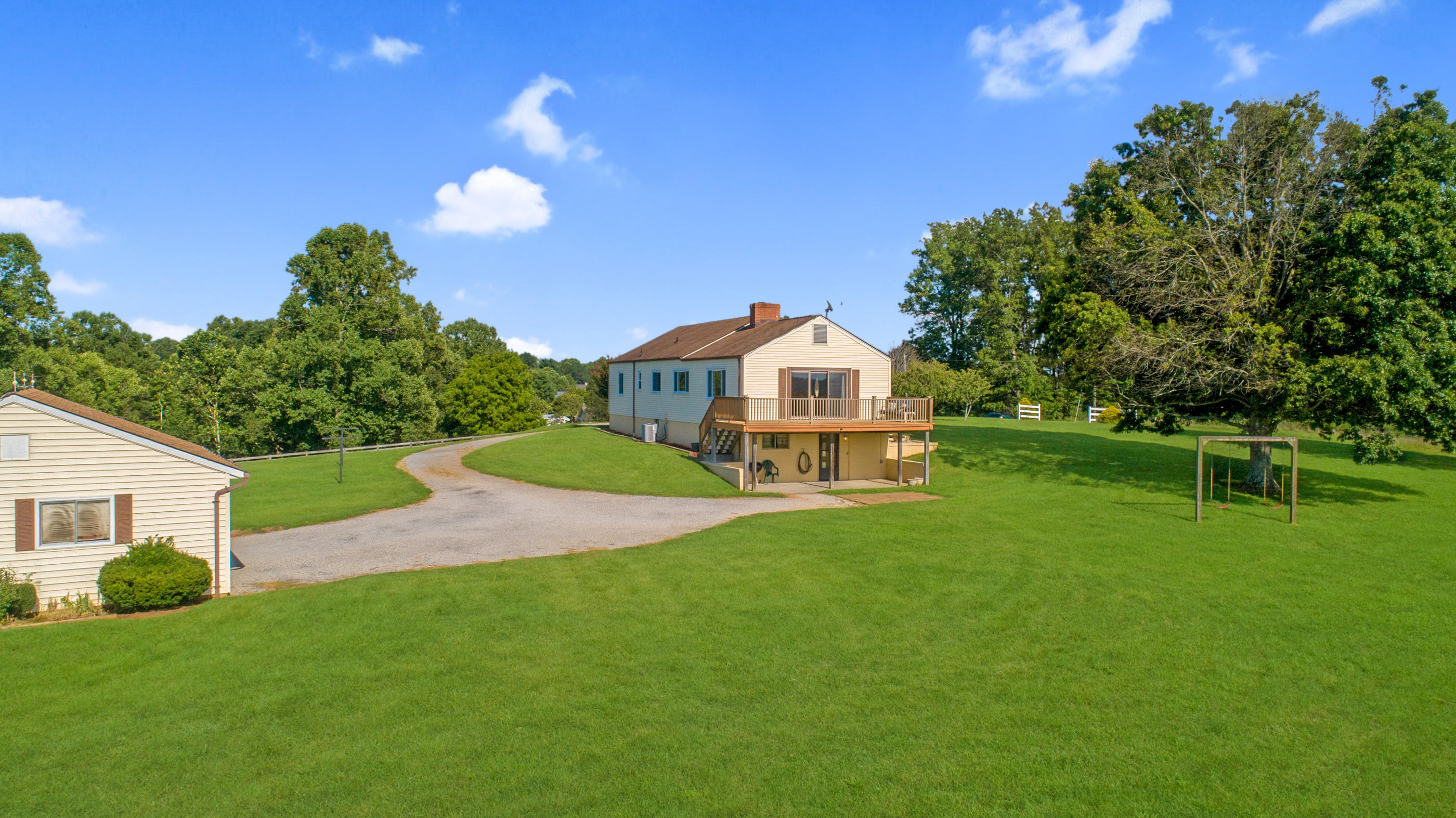 1311 Rock Spring Road Goodview, VA 24095 - Photo 49 of 54 a front view of a house with garden