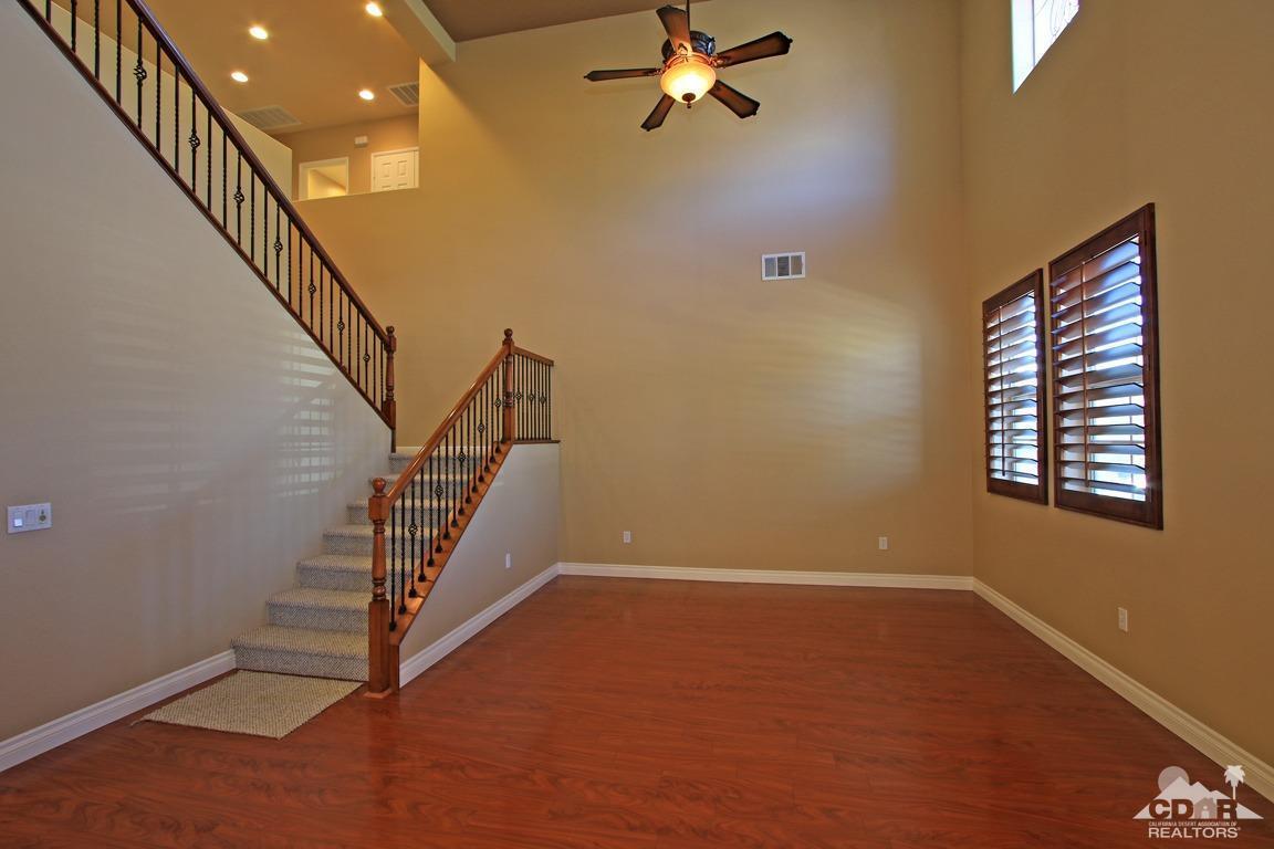 83271 Wagon Road Indio, CA 92203 - Photo 3 of 40 a view of entryway and hall with wooden floor