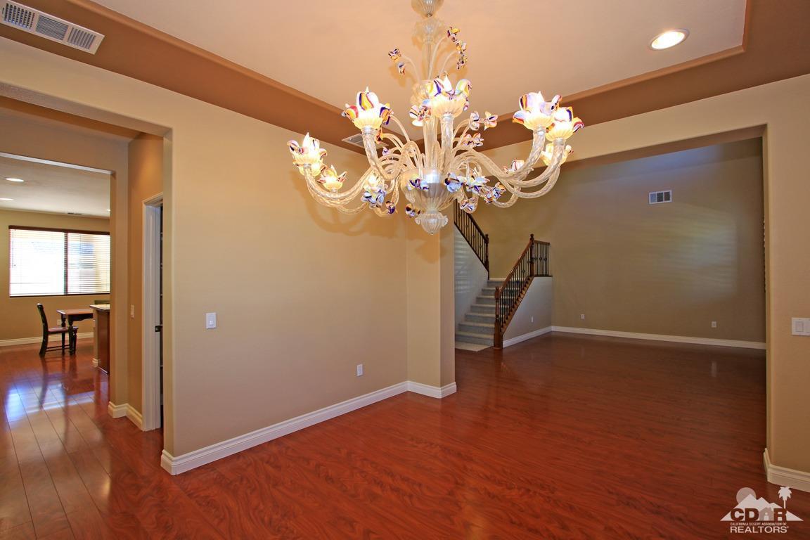 83271 Wagon Road Indio, CA 92203 - Photo 5 of 40 a view of a livingroom with wooden floor