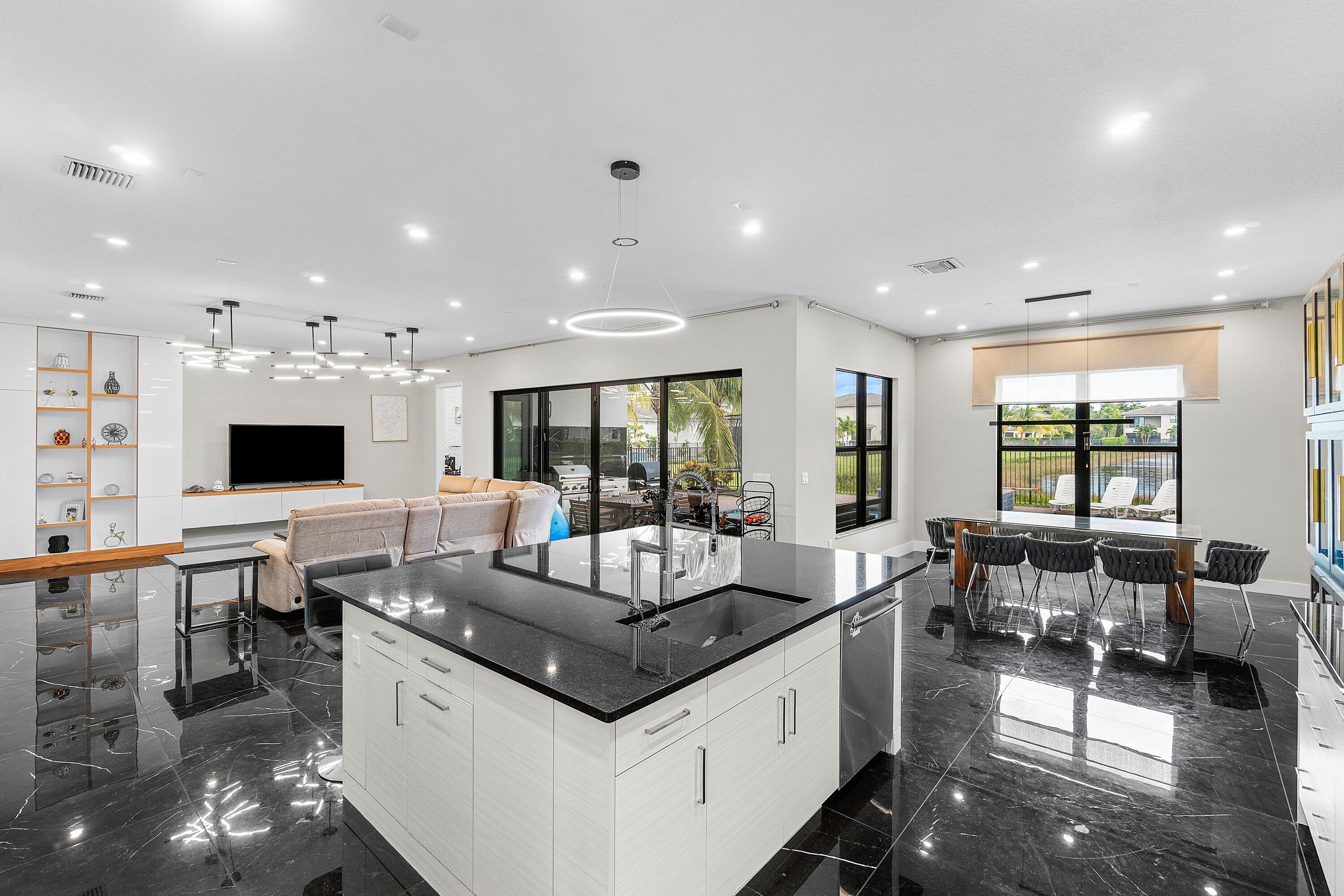 17238 Teton River Road Boca Raton, FL 33496 - Photo 15 of 67 a living room with furniture and a flat screen tv
