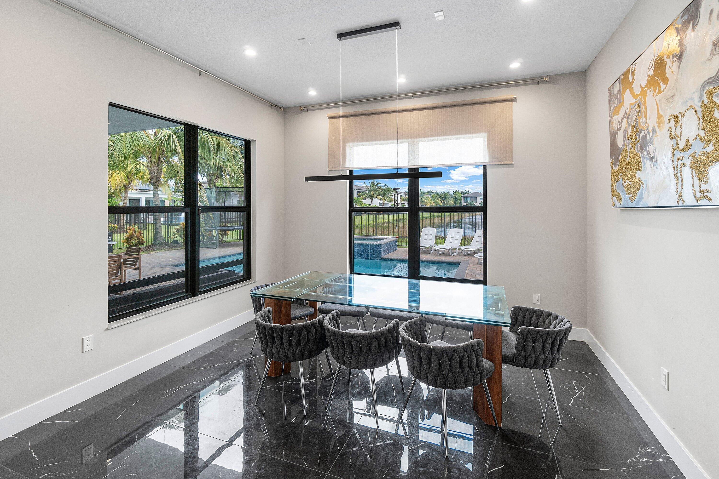 17238 Teton River Road Boca Raton, FL 33496 - Photo 16 of 67 a view of a dining room with furniture window and outside view