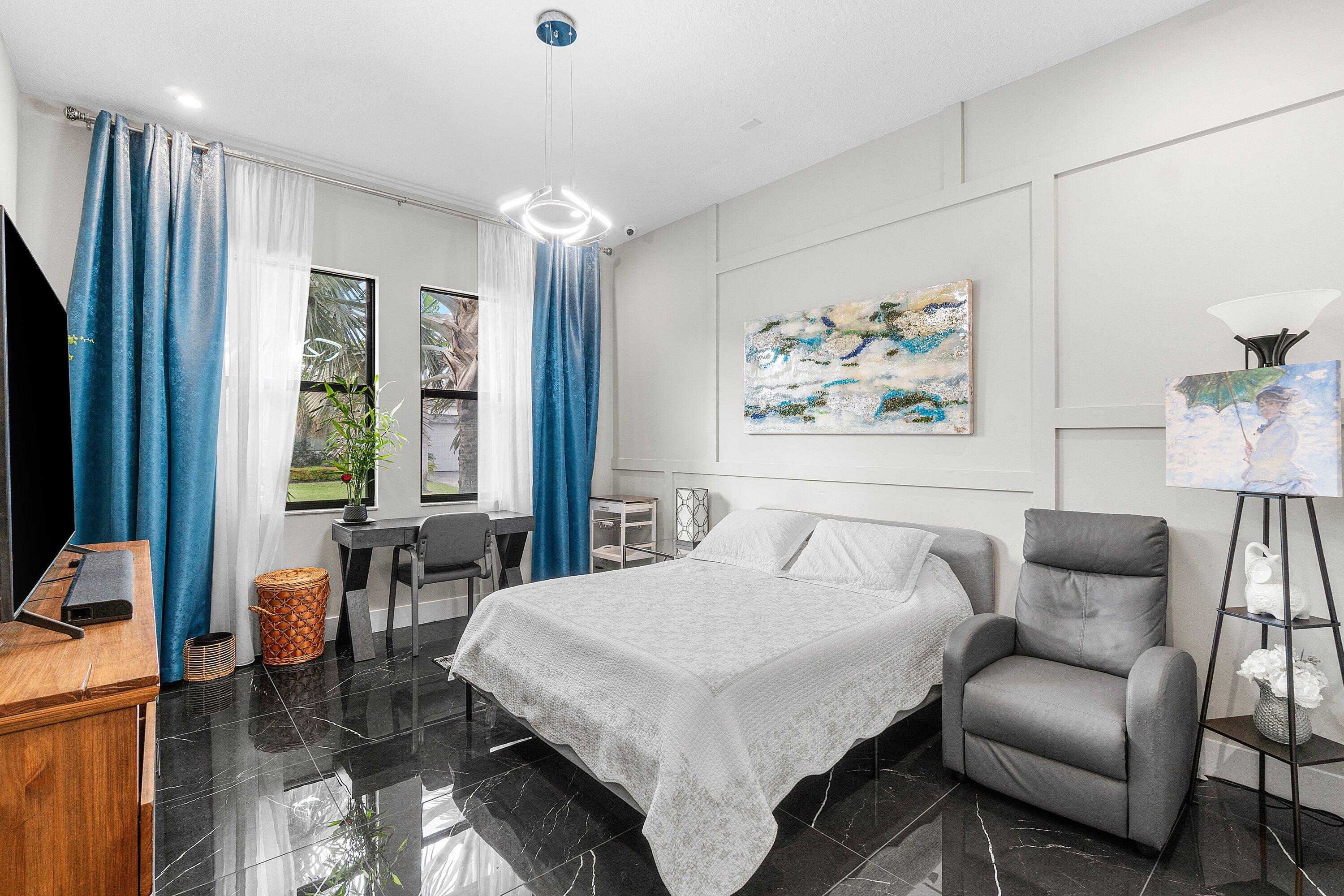 17238 Teton River Road Boca Raton, FL 33496 - Photo 22 of 67 a bedroom with furniture and a large window