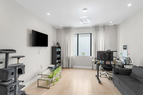 a view of swimming pool with outdoor space and seating area