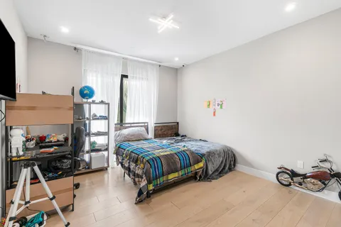 a view of a lake with houses in the background