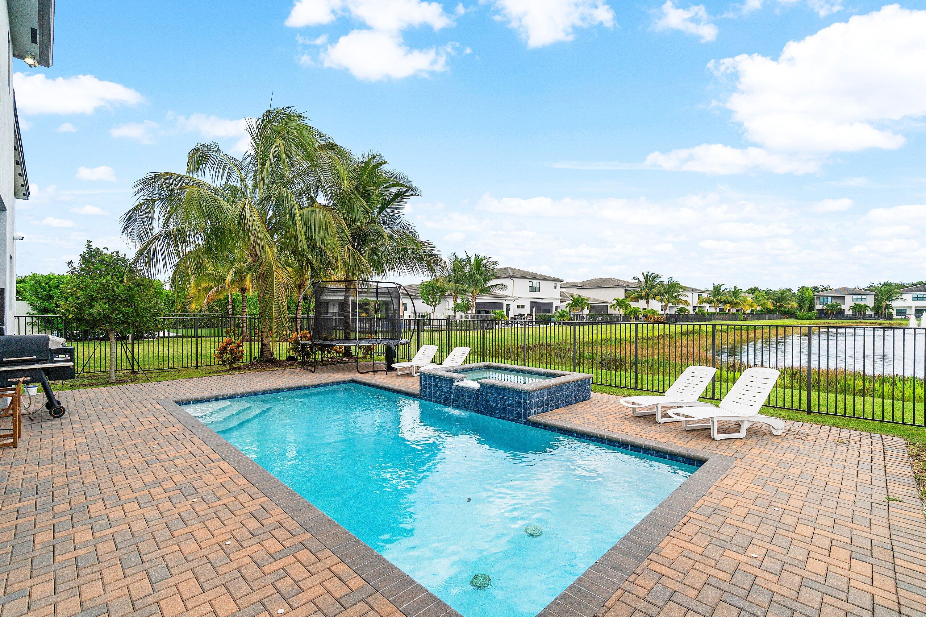 17238 Teton River Road Boca Raton, FL 33496 - Photo 45 of 67 a view of swimming pool with lounge chair in the patio
