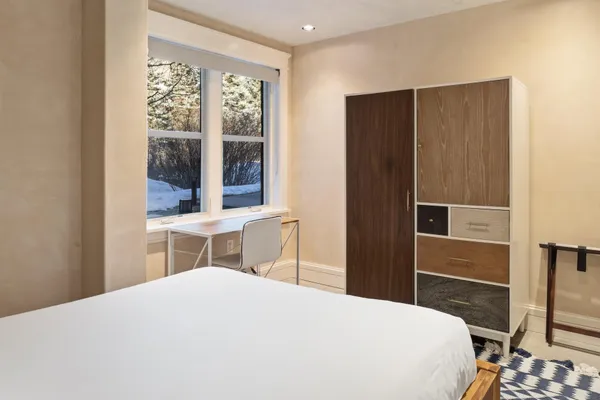 a bathroom with a sink a vanity and a mirror