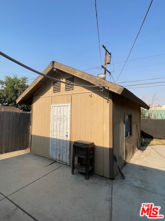 604 Eye Street Bakersfield, CA 93304 - Photo 16 of 33 a front view of a house with barbeque