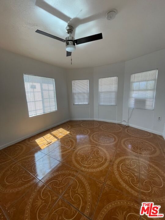 604 Eye Street Bakersfield, CA 93304 - Photo 28 of 33 a view of empty room with wooden floor