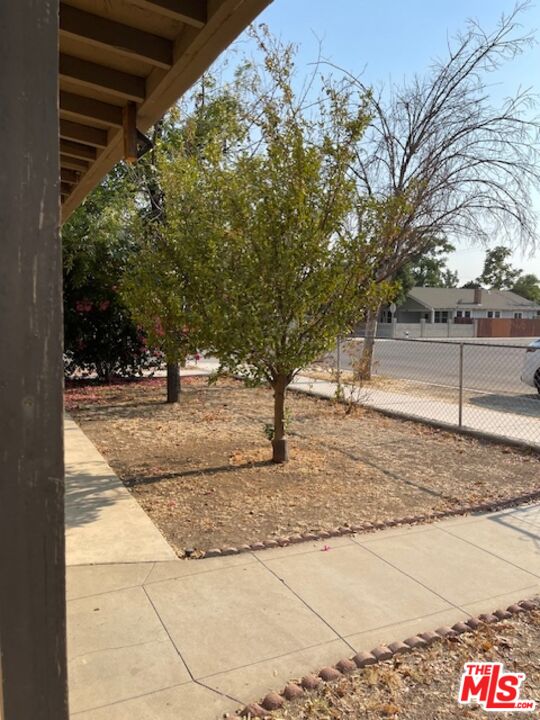 604 Eye Street Bakersfield, CA 93304 - Photo 3 of 33 a view of outdoor space with trees