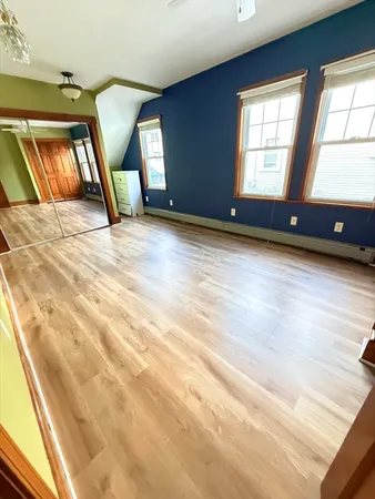 a view of an empty room and window