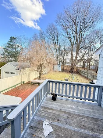 a view of a swimming pool with an outdoor seating