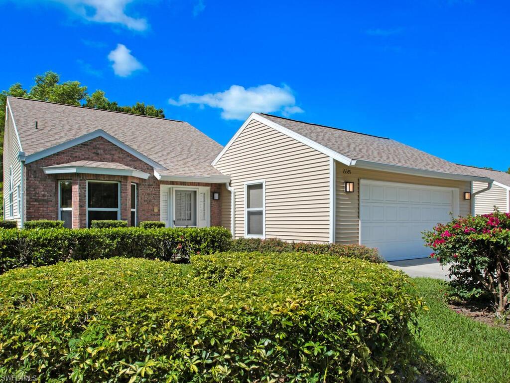 15335 Wimborne Lane Naples, FL 34110 - Photo 1 of 33 a view of a house with a yard