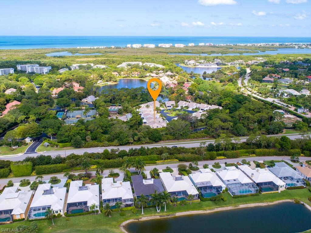 15335 Wimborne Lane Naples, FL 34110 - Photo 3 of 33 a view of an outdoor space and lake view