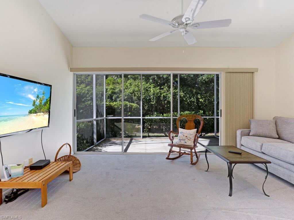 15335 Wimborne Lane Naples, FL 34110 - Photo 8 of 33 a view of a room with workspace and windows