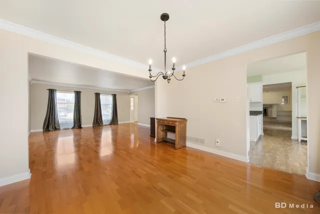 a view of a livingroom with a furniture chandelier