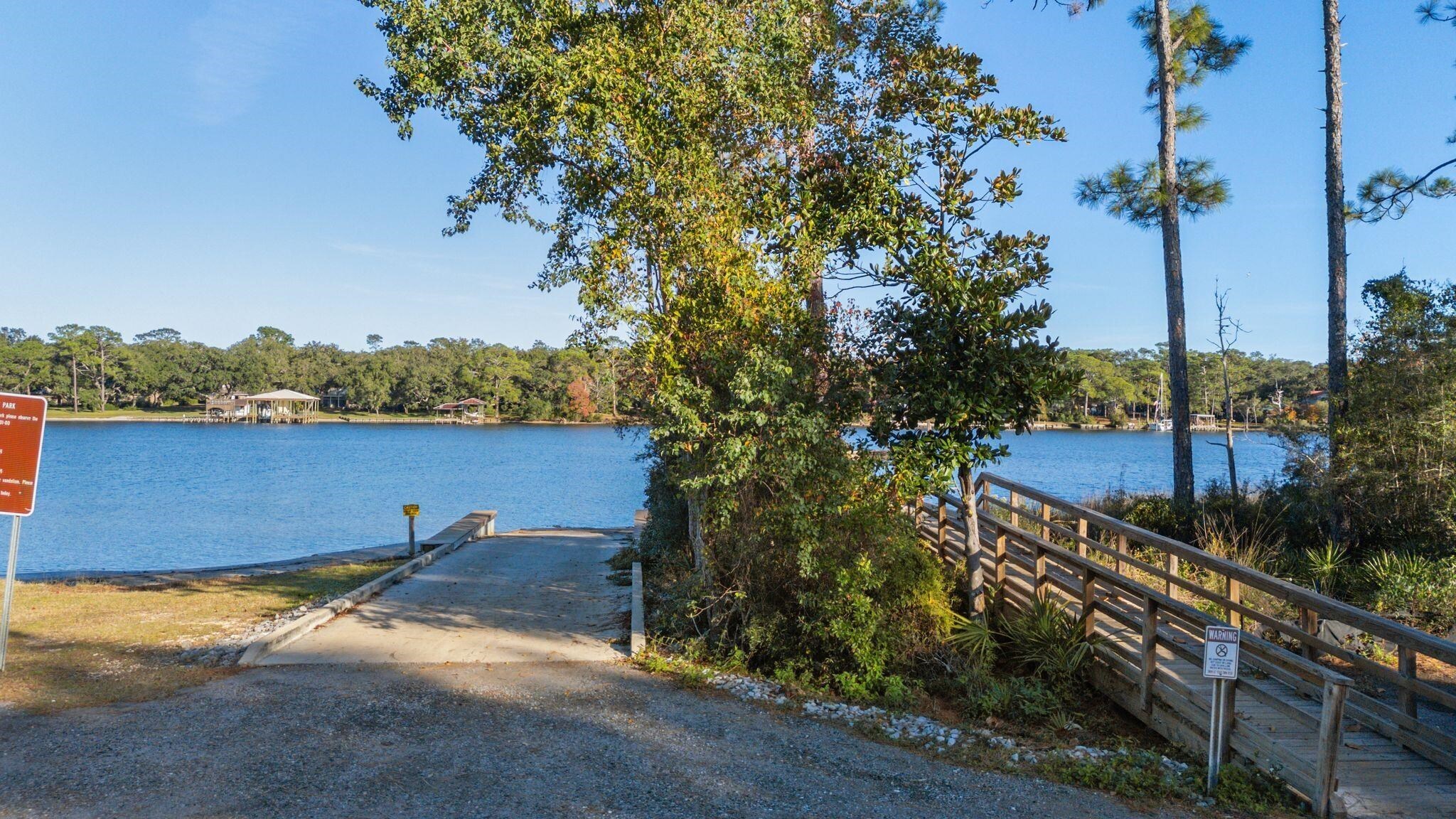 8657 Anniston Drive Elberta, AL 36530 - Photo 11 of 21 Dock area with a boat ramp and a water view