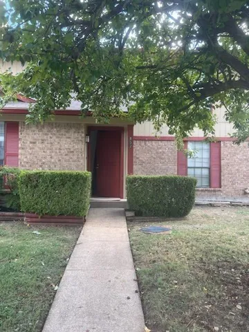 a view of a back yard of the house